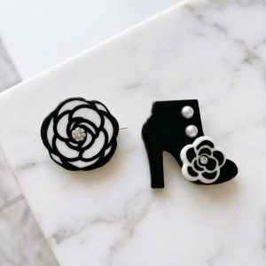 Camelia and Heel Brooches